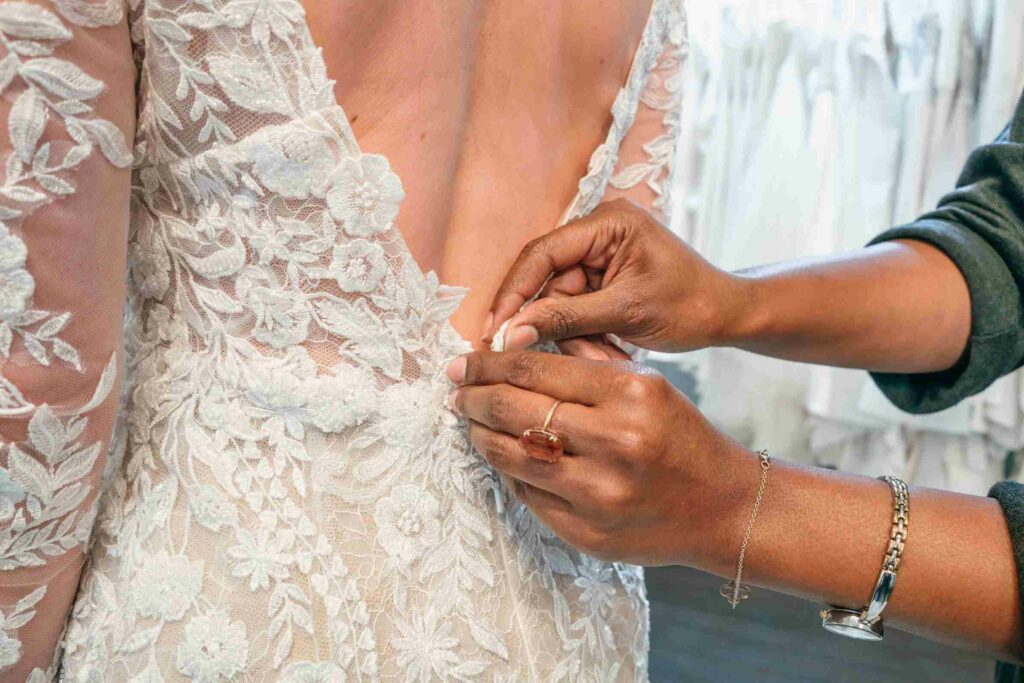 Pinning a Wedding Dress at Evelie