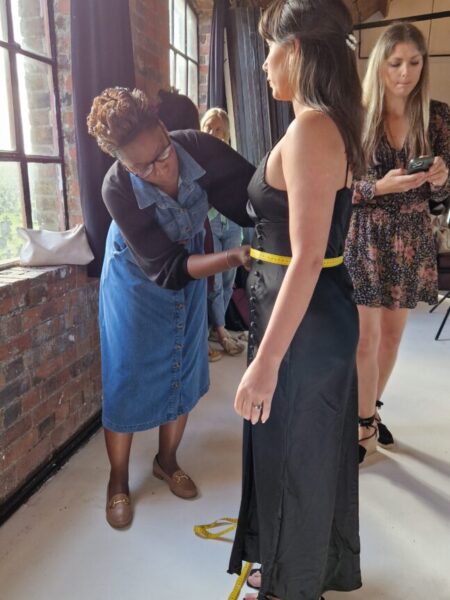 Marie from Evelie taking Sabrina body measurements