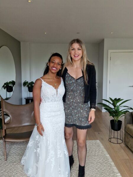 Nicole from Love is Blind  wearing her wedding dress next to Caroline from Evelie